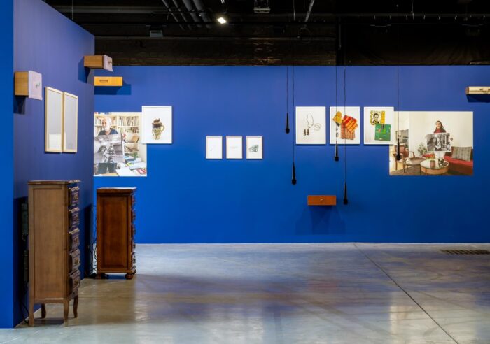 Badr El Hammami Entre nos mains, 2022- 2026 Installation in-situ, dimensions variables, deux meubles en bois (60 x 37 x 90cm et 50 x 34 x 104 cm), 11 tiroirs découpés, quatres photographies encadrées (52 x 42cm), deux dessins encadrés (70 x 60 cm), deux polaroids (38 x 26 cm), trois photographies (42 x 31cm), deux photographies wallpaper (90x120 cm). Courtesy de l’artiste et de l’adagp, Paris, 2026. © La Condition Publique & Le Cube - independent art room photo: Frédéric IOVINO